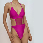 Traje de baño de una pieza con cuello halter, manga larga y malla sólida con lazo y cubierta.